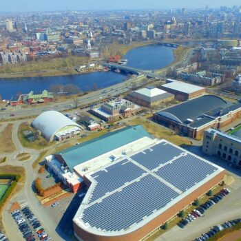 Installation of a 570 kW solar array at Harvard University’s Gordon Indoor Track facility.