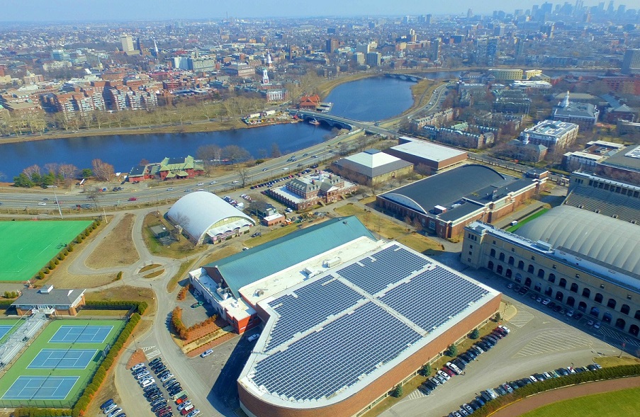 Installation of a 570 kW solar array at Harvard University’s Gordon Indoor Track facility.